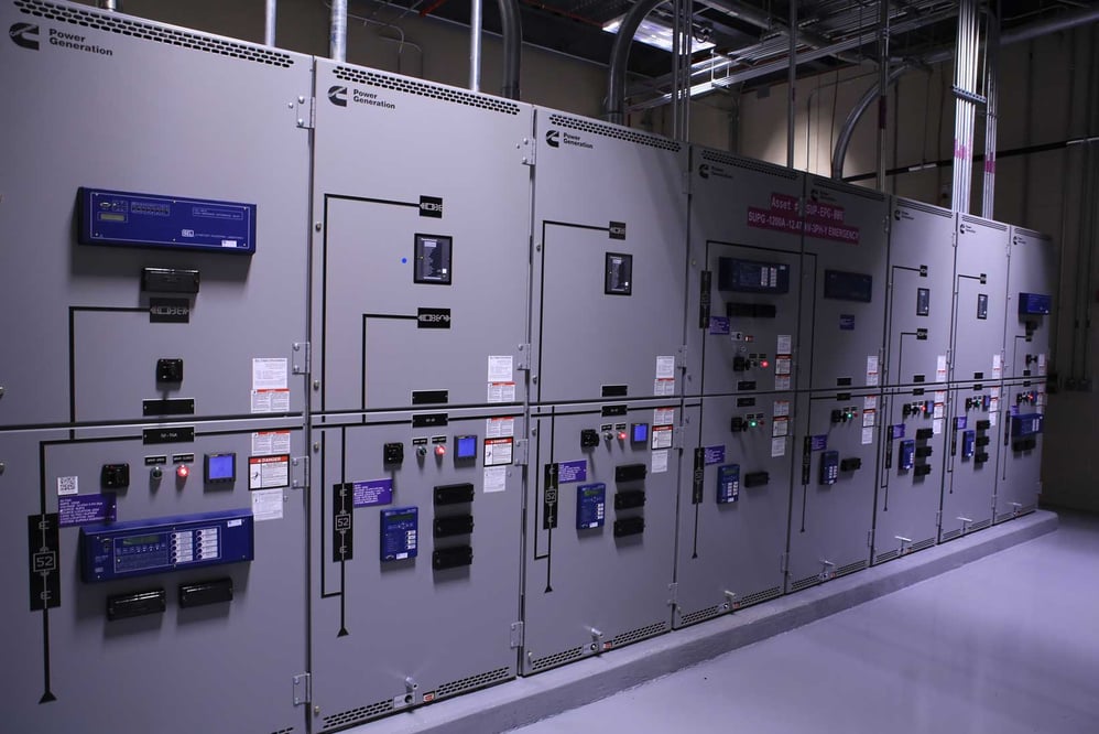 Rows of electrical control panels and equipment