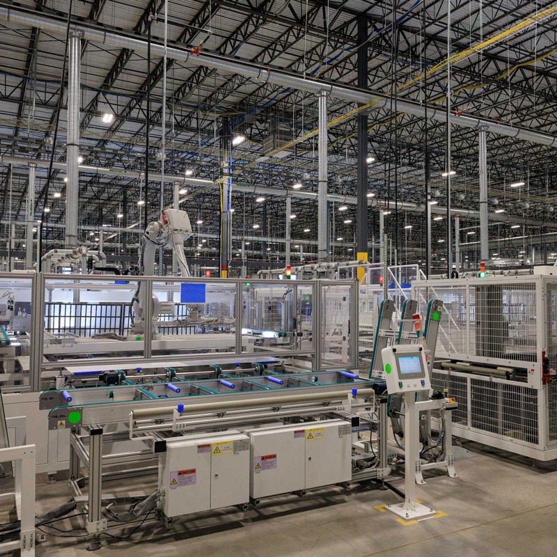 interior view of robotic arms and manufacturing machines
