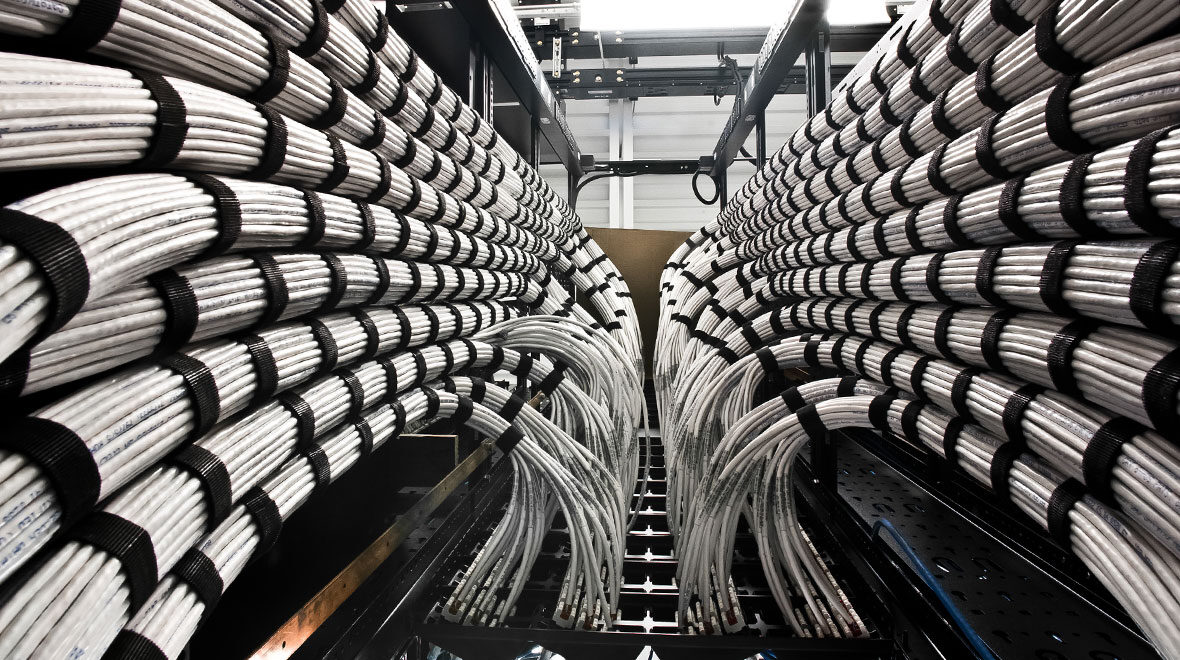 A spacious room filled with numerous cables and wires