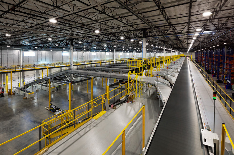 manufacturing facility with conveyors surrounding