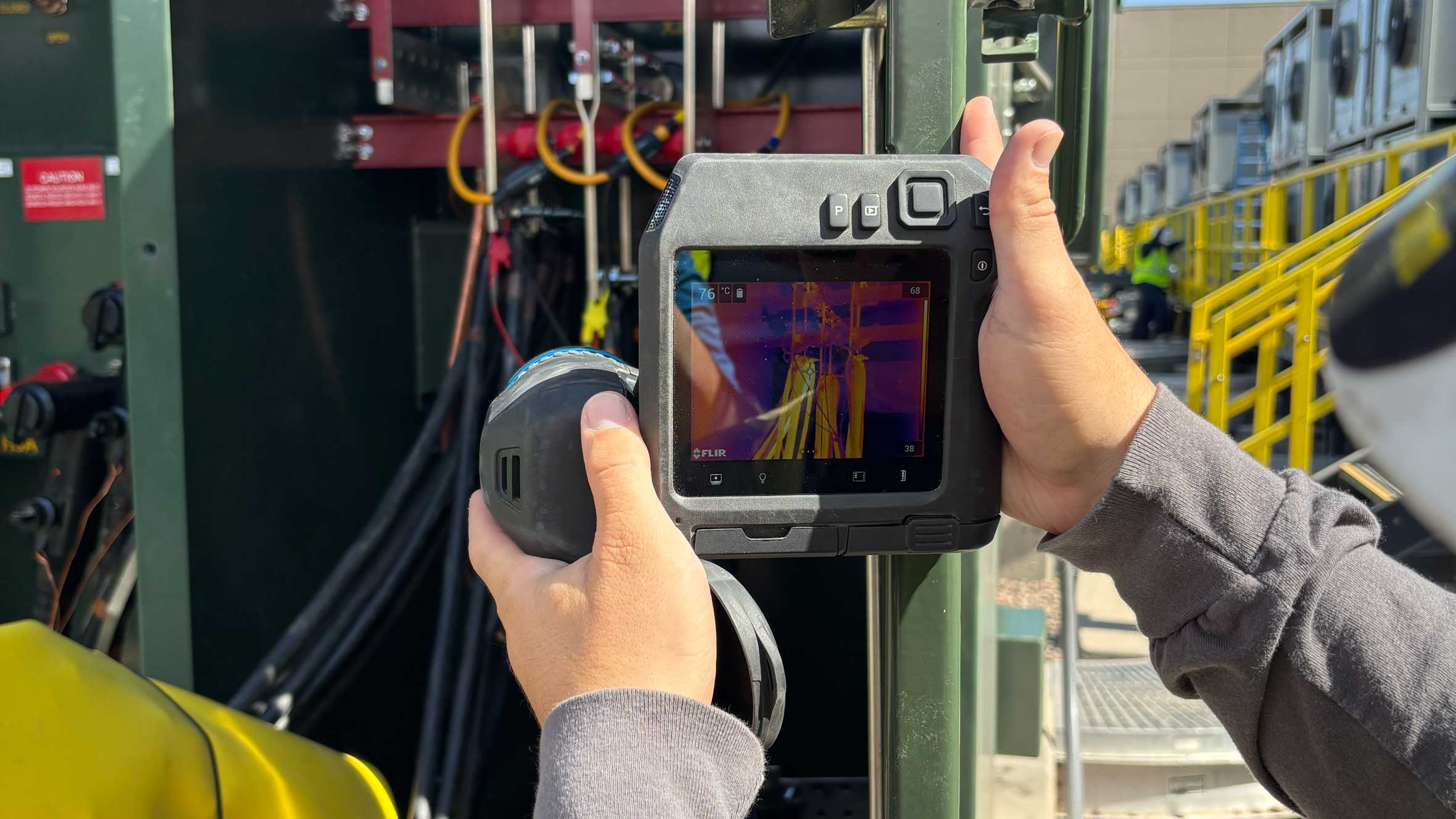 view of an IR scanner analyzing electrical equipment