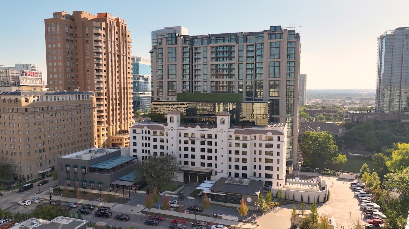 Aerial view of a renovated high-rise building in a downtown area