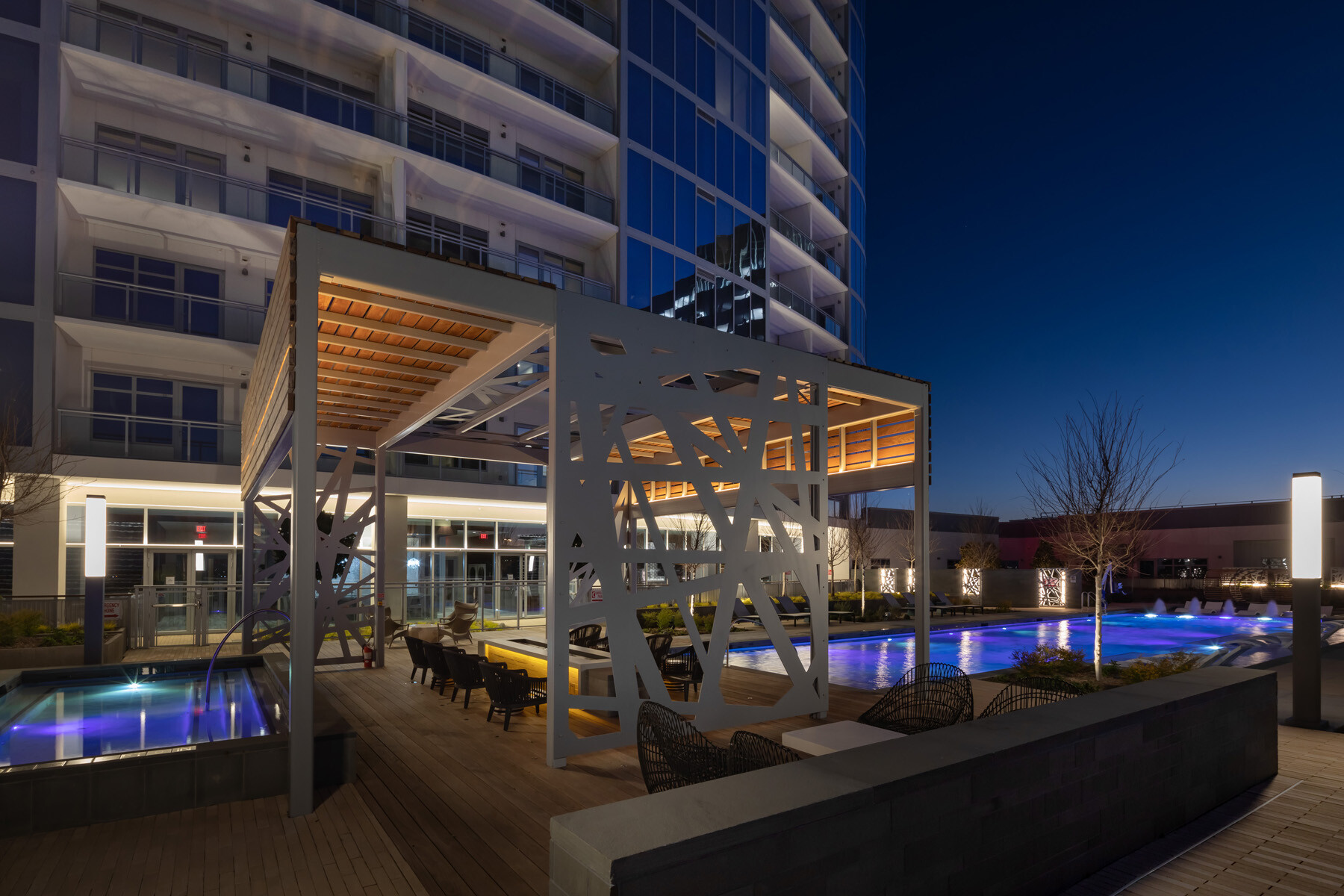 Exterior pool area outside of a luxury hotel