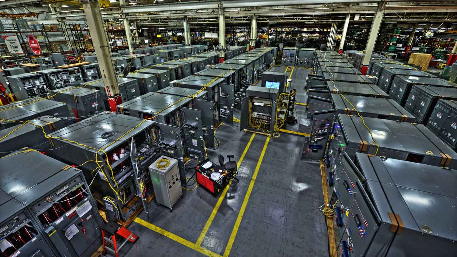 indoor overhead view of parallel electrical switchgear