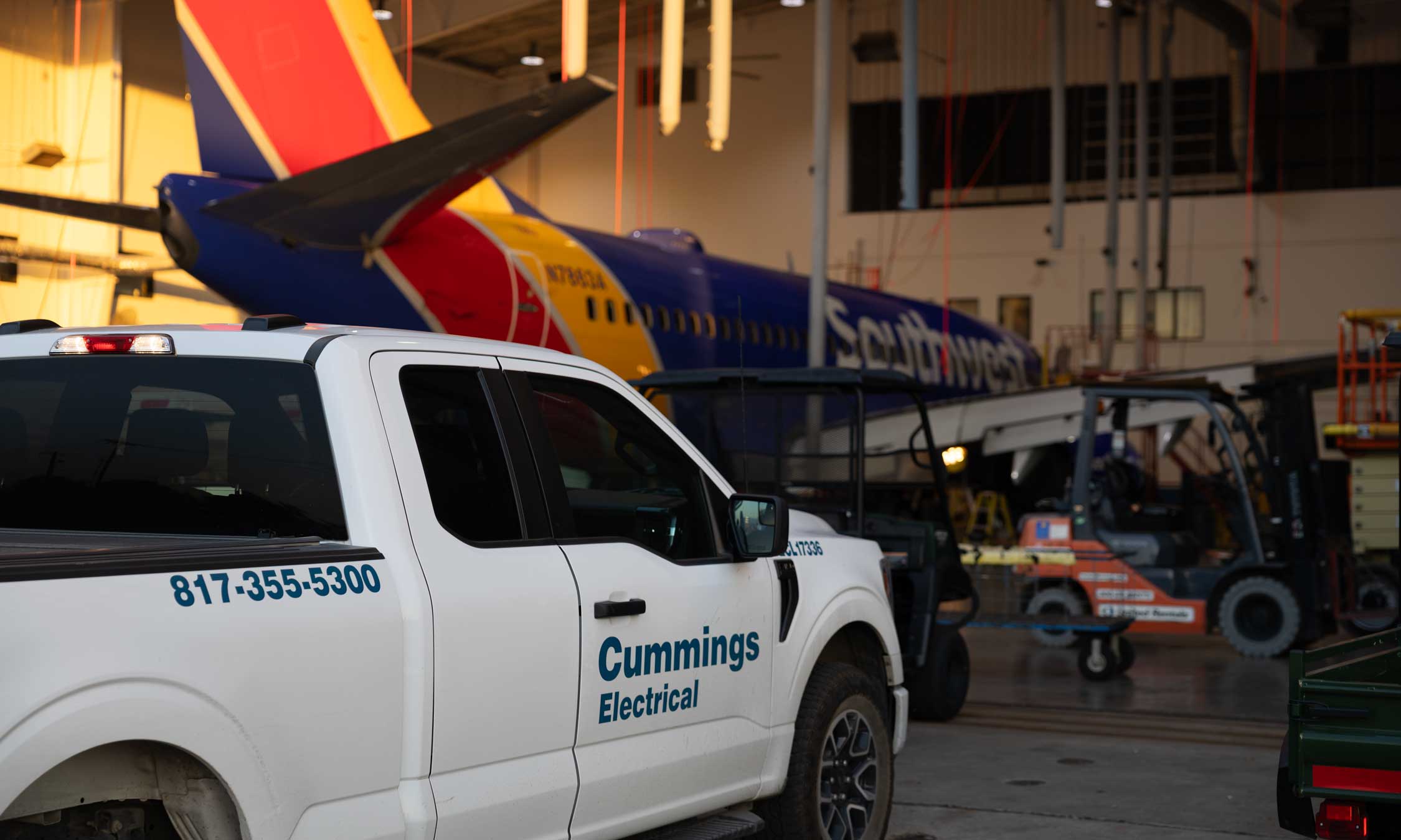 Cummings Electrical service truck at Southwest Airlines hangar