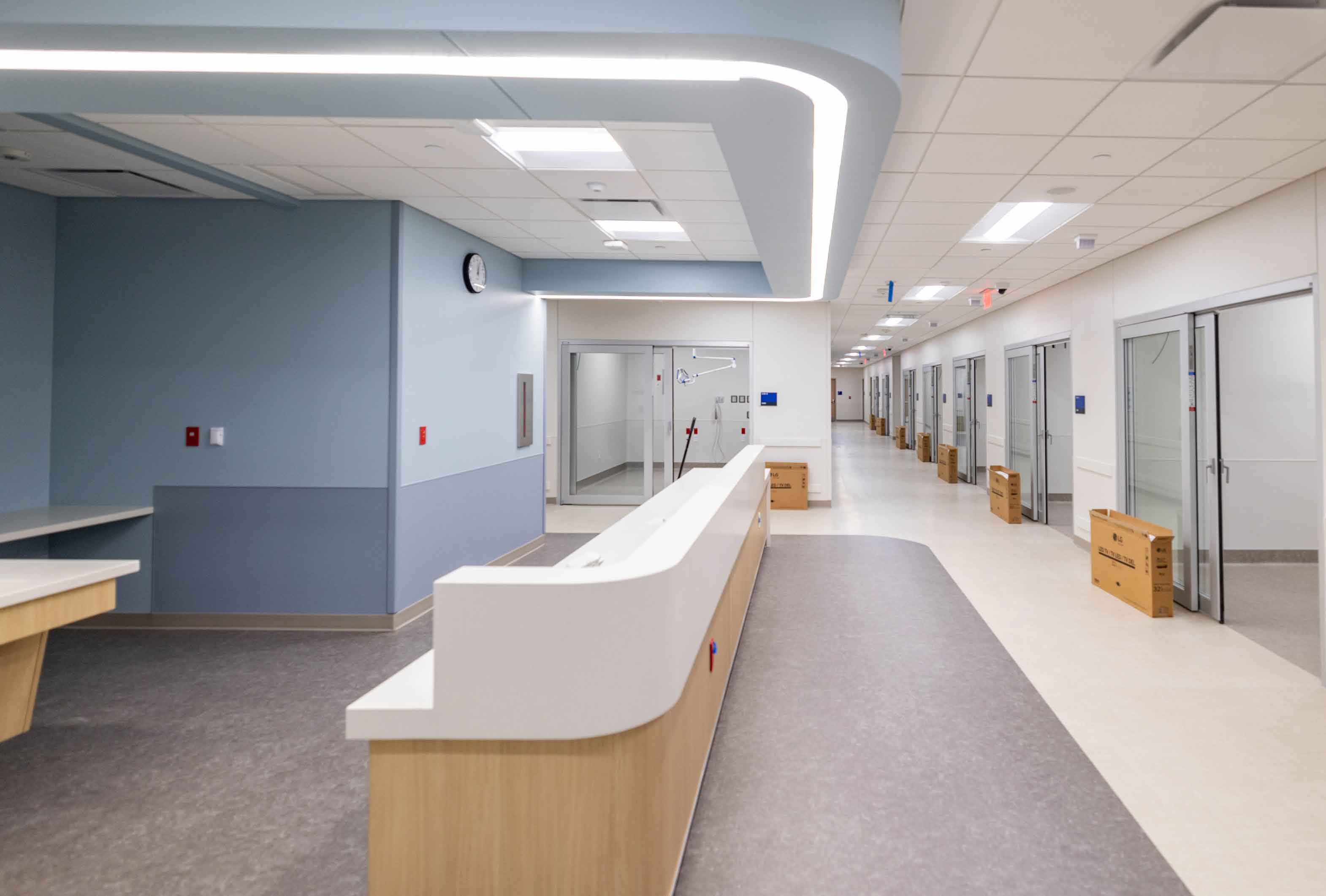 Interior of a fully lit medical hospital hallway still in construction
